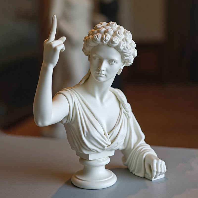 Statue de sorcière au doigt d'honneur